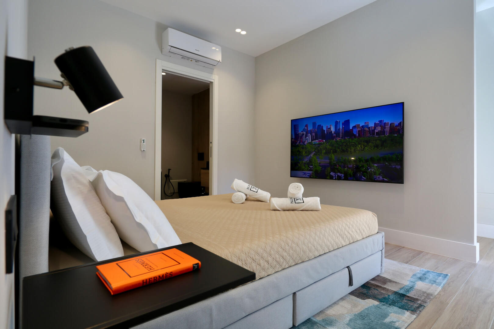 Luxury king-size bed with great mattress, premium linens, and custom-made pillows.